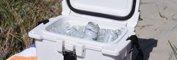 KONG Cooler 20 quart filled with ice and 2 beverages