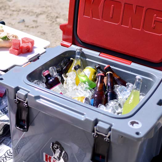 KONG Cooler 25 quart open filled with ice and beverages