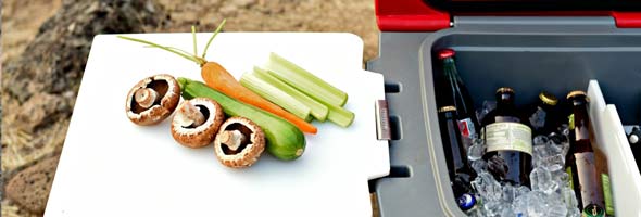 KONG Cooler 50 quart with cutting board attached using KONG Kicker