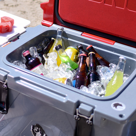 Kong 50 quart rotomolded cooler filled with beverages and ice